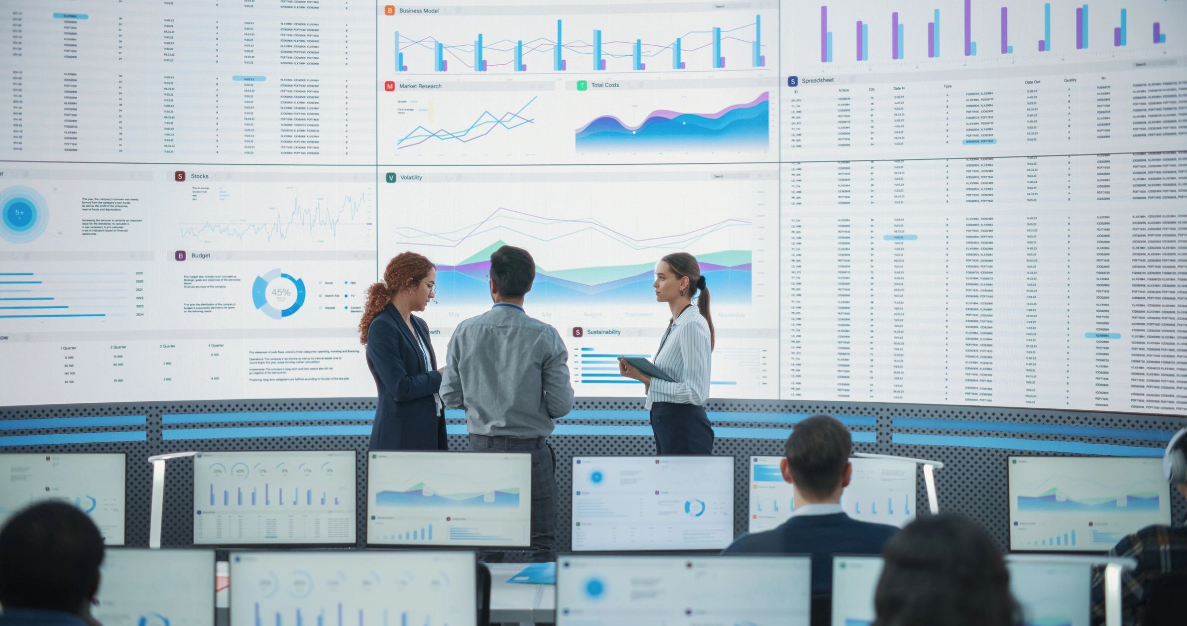 Operations team reviewing logistics data in a control room