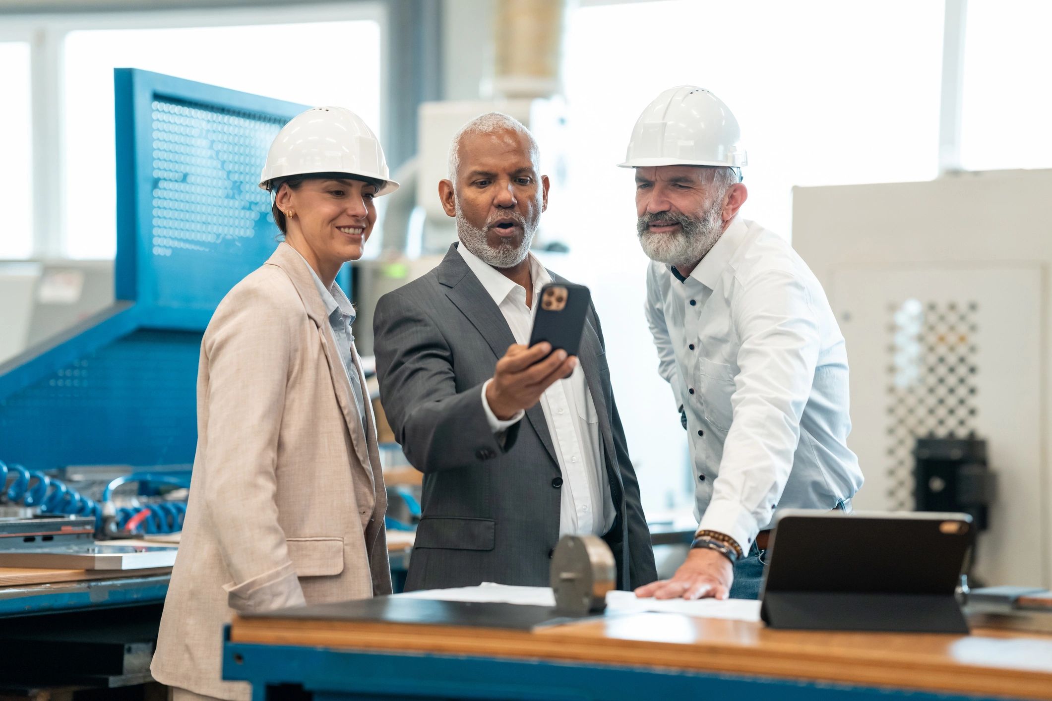 Logistics professionals collaborating on production and transport planning