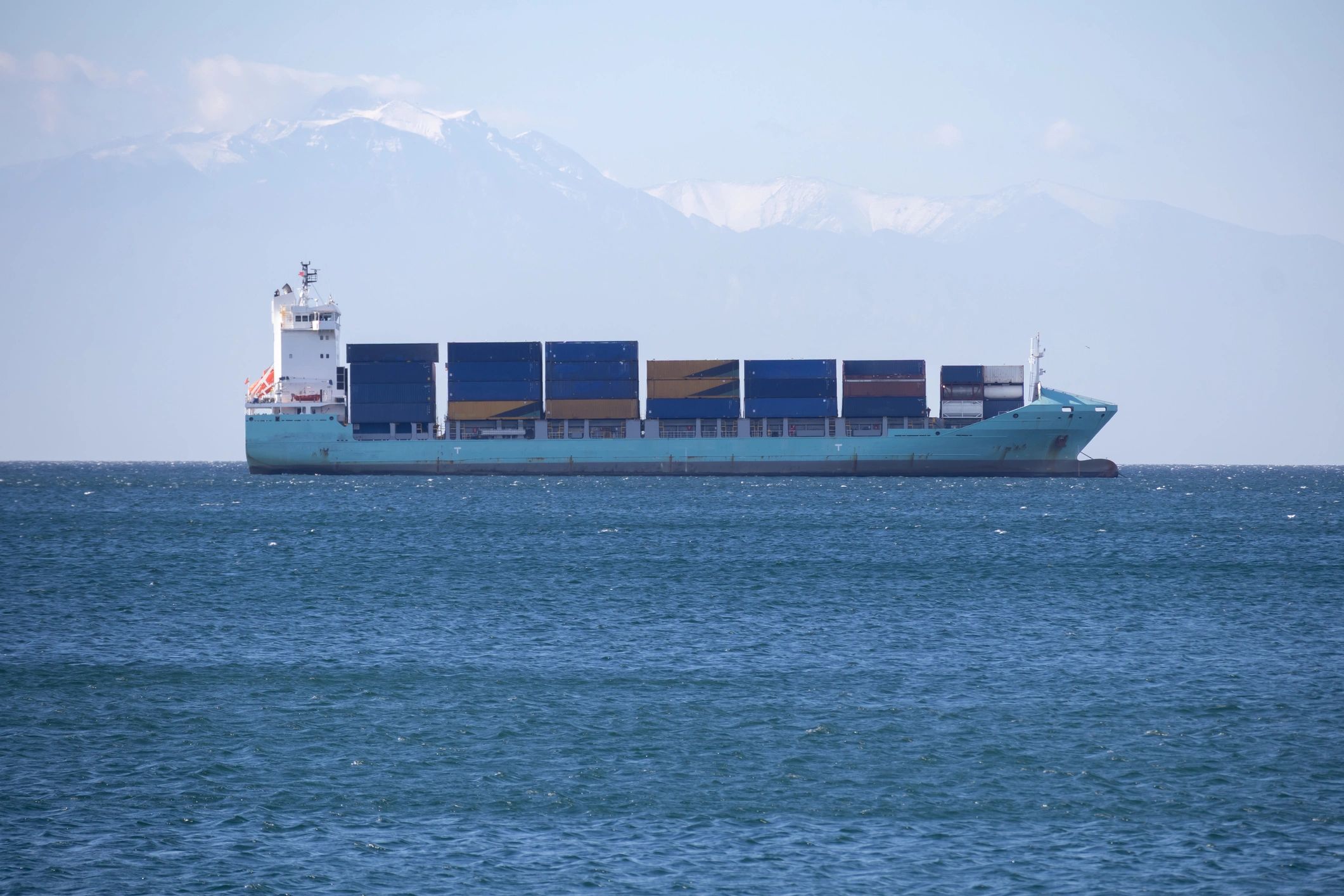 Cargo ship at sea representing global shipping logistics